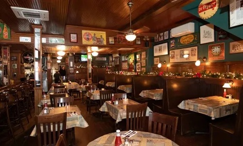 a restaurant with tables and chairs