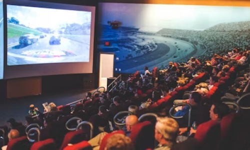 a theater with people in seats